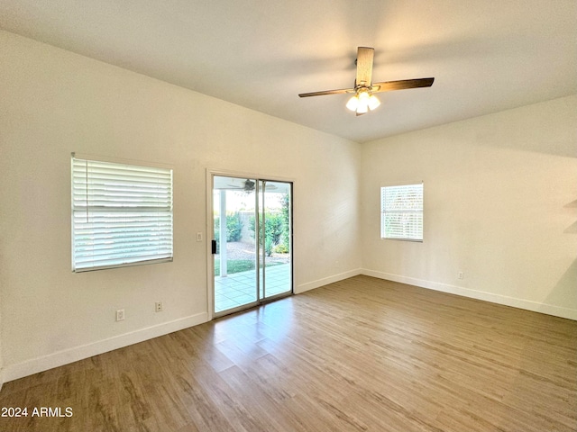 unfurnished room featuring light hardwood / wood-style flooring and ceiling fan