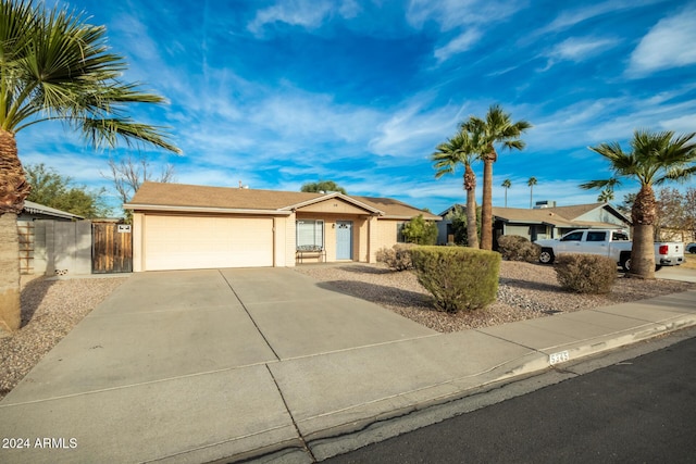 single story home featuring a garage