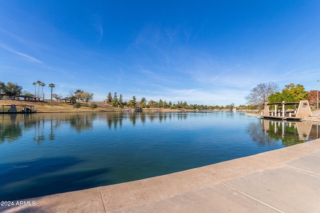 dock area featuring a water view