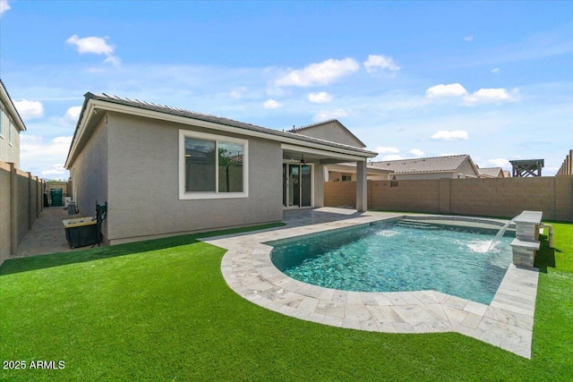view of swimming pool featuring a yard, a fenced in pool, and a fenced backyard