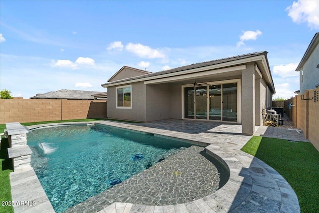 view of swimming pool featuring a fenced in pool, a fenced backyard, and a patio area