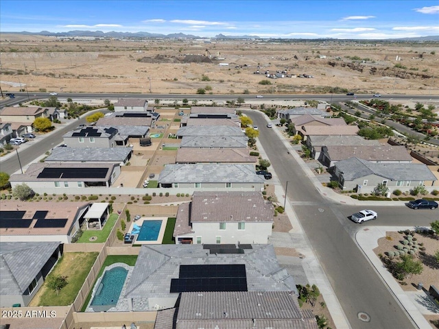 birds eye view of property featuring a mountain view and a residential view