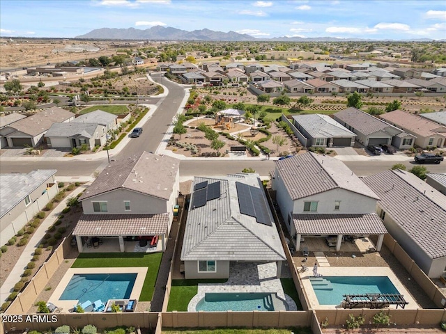 bird's eye view featuring a residential view and a mountain view