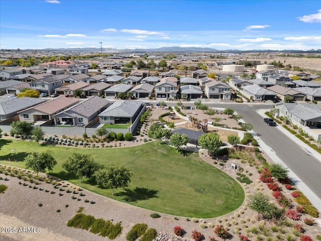 bird's eye view with a residential view and a mountain view
