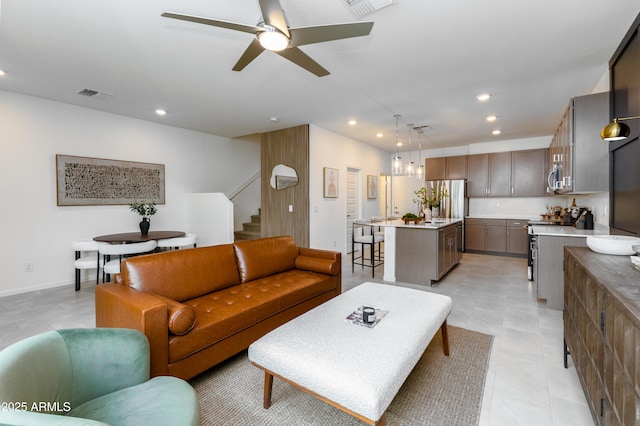 651 N Ironwood Rd Unit 9-12, Apache Junction, AZ 85119 - living area with recessed lighting, stairway, and ceiling fan