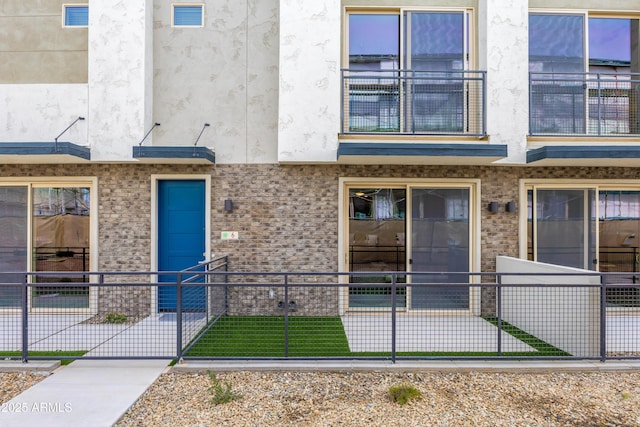 651 N Ironwood Rd Unit 9-12, Apache Junction, AZ 85119 - property entrance featuring stucco siding and brick siding
