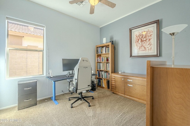 office area featuring visible vents, baseboards, carpet, and a ceiling fan