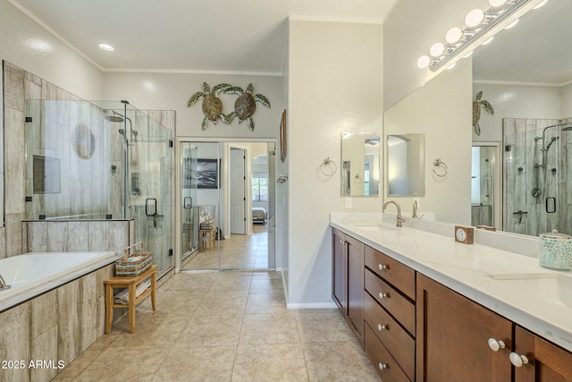 full bath with double vanity, ornamental molding, a stall shower, and a sink