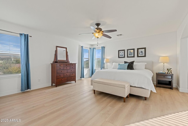 bedroom with ceiling fan, light hardwood / wood-style flooring, and access to outside