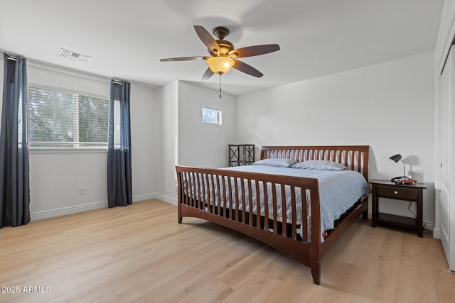 bedroom featuring light wood-type flooring and ceiling fan