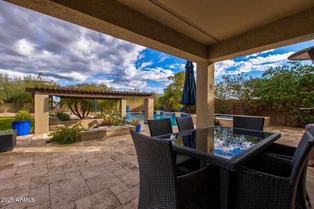 view of patio with a pergola and a pool