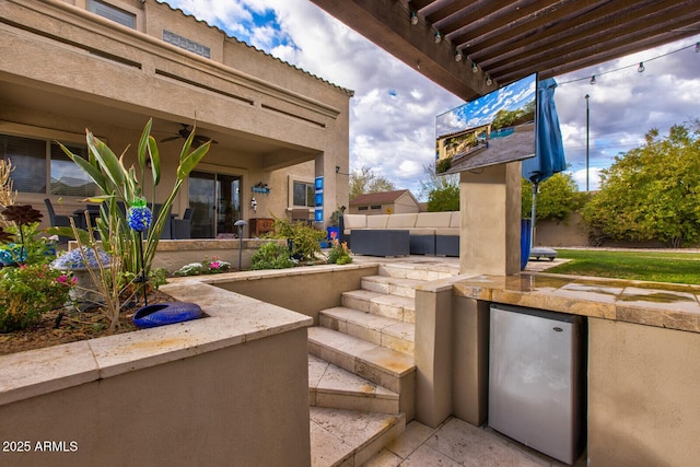 view of patio / terrace featuring an outdoor kitchen