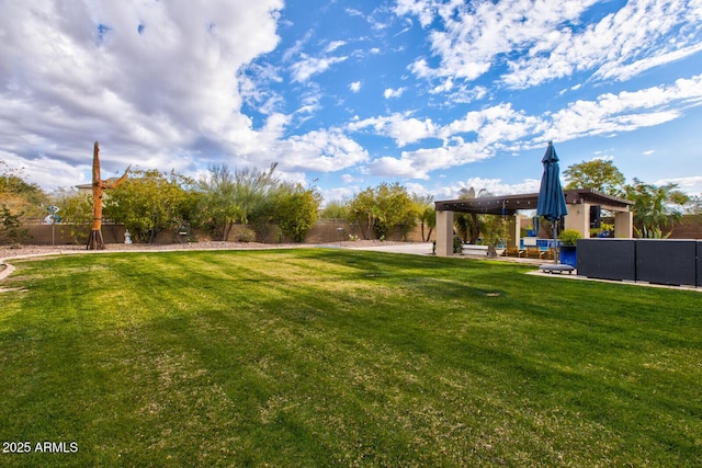 view of yard with a pergola, an outdoor hangout area, and a patio