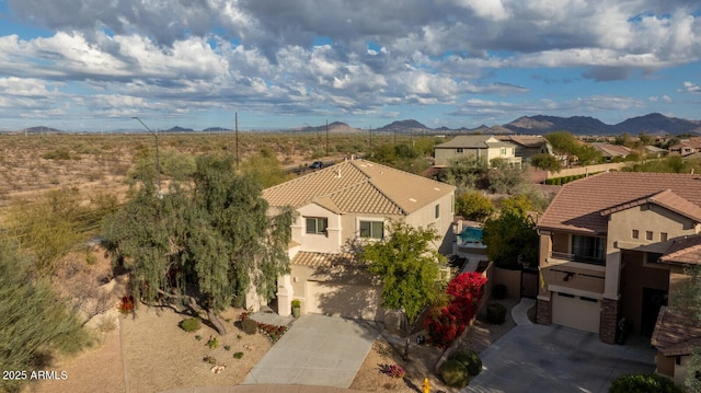 drone / aerial view featuring a mountain view