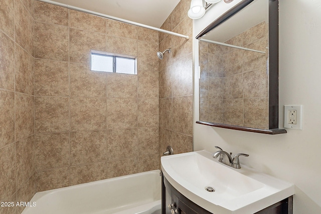 bathroom featuring vanity and bathing tub / shower combination