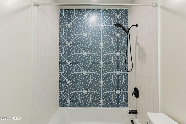 full bathroom featuring toilet and bathing tub / shower combination