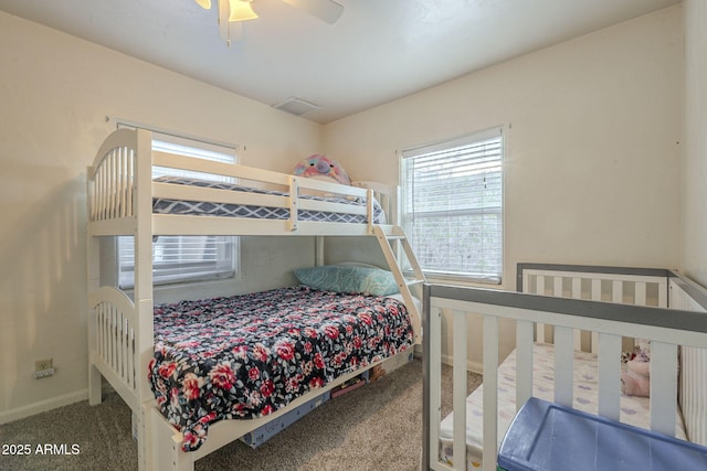 bedroom with carpet floors, baseboards, and a ceiling fan