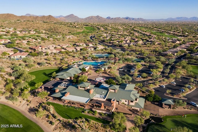 aerial view featuring a residential view, a mountain view, and golf course view