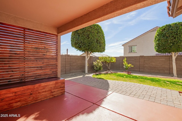 view of patio with a fenced backyard