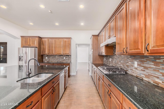5713 W Rowel Rd, Phoenix, AZ 85083 - kitchen with appliances with stainless steel finishes, sink, decorative backsplash, and dark stone counters