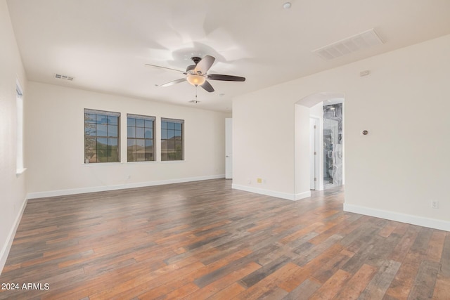 5713 W Rowel Rd, Phoenix, AZ 85083 - spare room with dark hardwood / wood-style flooring and ceiling fan