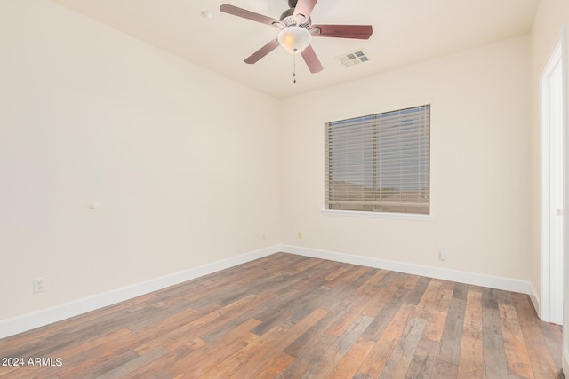 5713 W Rowel Rd, Phoenix, AZ 85083 - unfurnished room featuring hardwood / wood-style flooring and ceiling fan