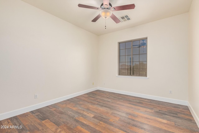 5713 W Rowel Rd, Phoenix, AZ 85083 - unfurnished room featuring dark wood-type flooring and ceiling fan