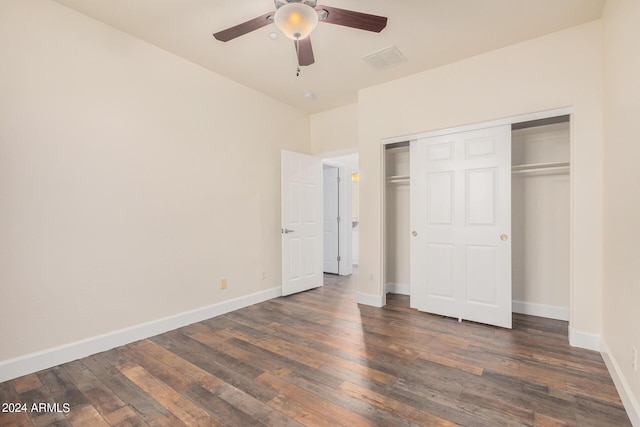 5713 W Rowel Rd, Phoenix, AZ 85083 - unfurnished bedroom with dark hardwood / wood-style flooring, a closet, and ceiling fan
