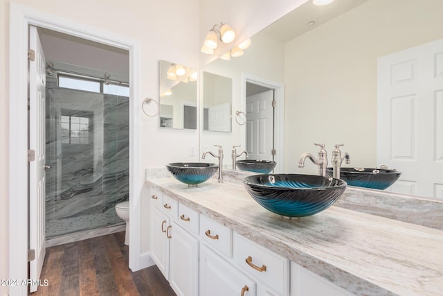 5713 W Rowel Rd, Phoenix, AZ 85083 - bathroom featuring walk in shower, vanity, toilet, and hardwood / wood-style flooring