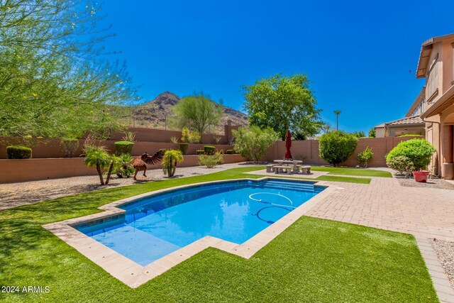 5713 W Rowel Rd, Phoenix, AZ 85083 - view of swimming pool with a patio and a lawn