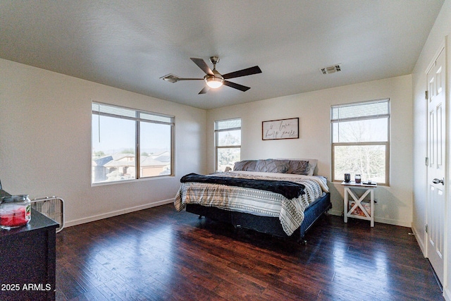 bedroom featuring ceiling fan and dark hardwood / wood-style flooring