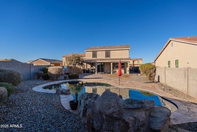 view of pool featuring a patio area