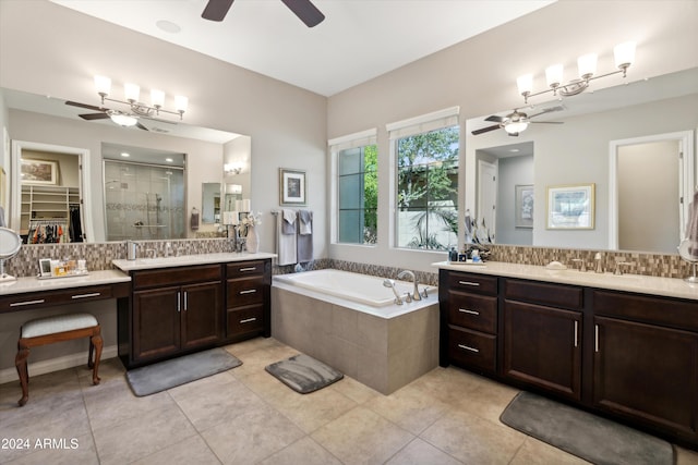 bathroom featuring ceiling fan, vanity, separate shower and tub, and tile patterned flooring