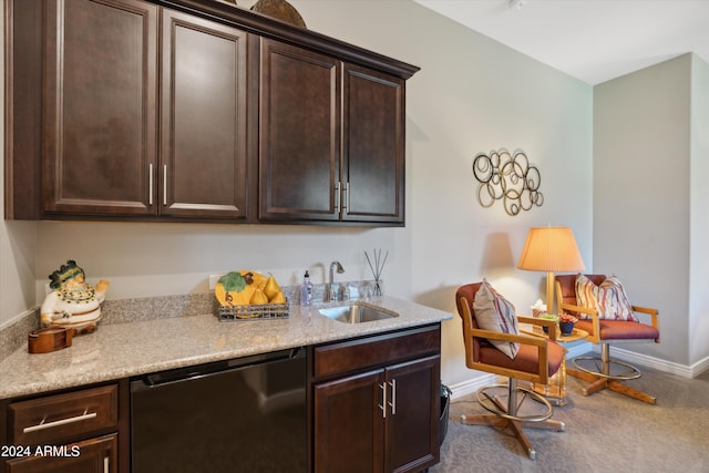 kitchen with dishwasher, dark brown cabinets, and sink