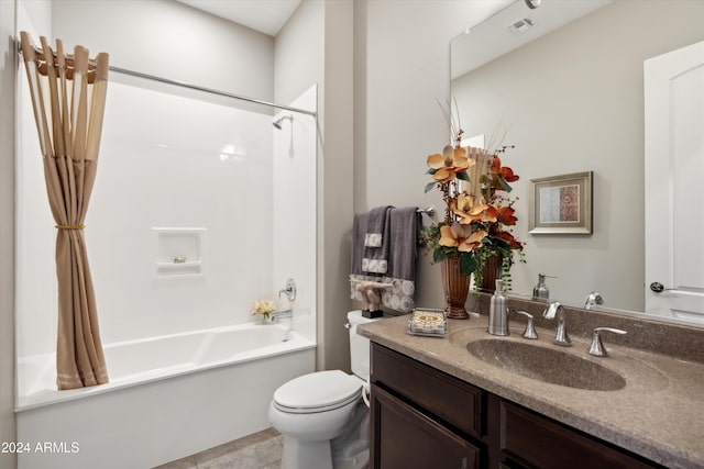 full bathroom with vanity, shower / tub combo with curtain, and toilet