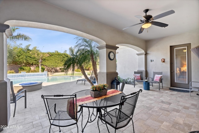 view of patio / terrace featuring ceiling fan