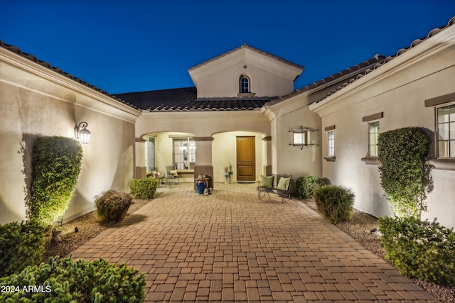 view of patio at twilight