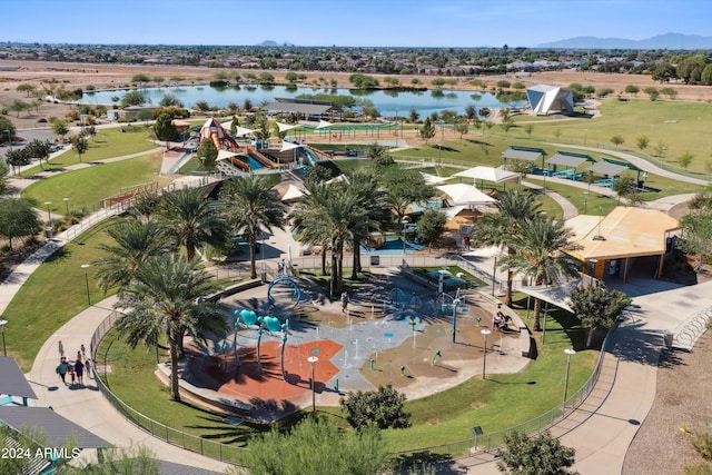 birds eye view of property featuring a water and mountain view