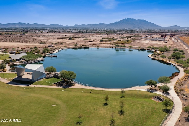 bird's eye view with a water and mountain view