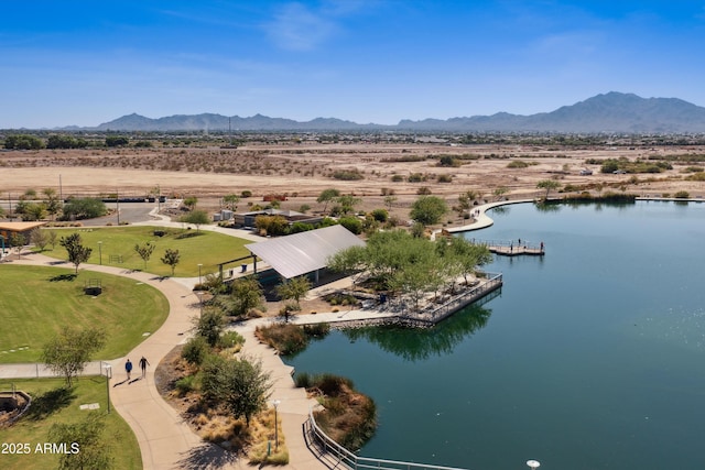 aerial view featuring a water and mountain view