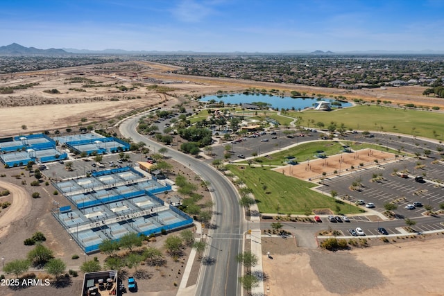 aerial view featuring a water and mountain view