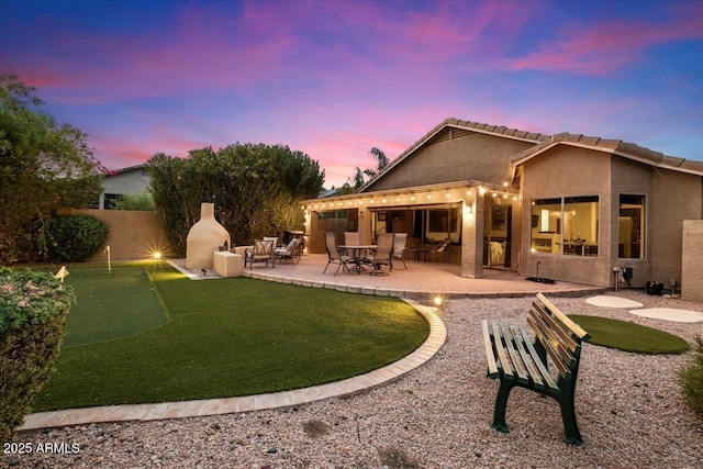 7471 E Desert Vista Rd, Scottsdale, AZ 85255 - rear view of house featuring stucco siding, fence, and a patio area