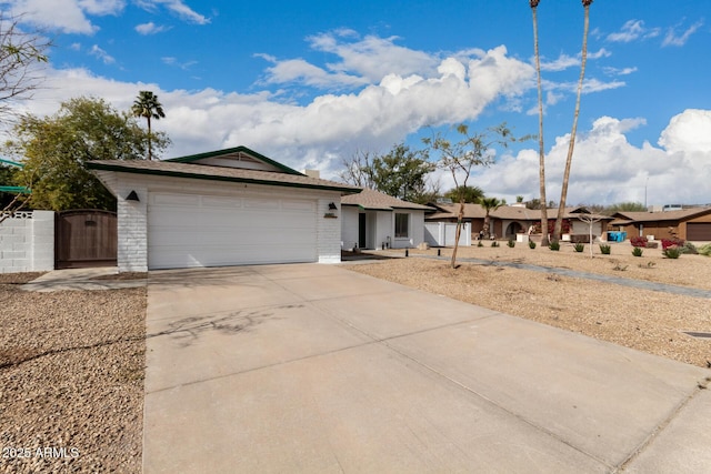 ranch-style house featuring a garage