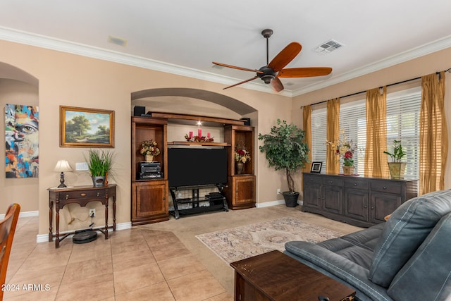 living room with light tile patterned floors, ceiling fan, and ornamental molding