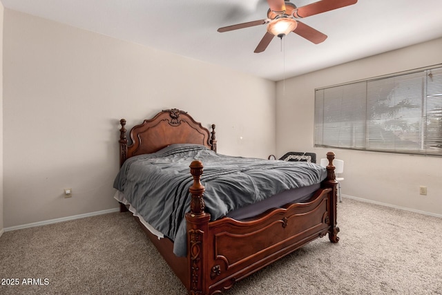 carpeted bedroom with baseboards and ceiling fan