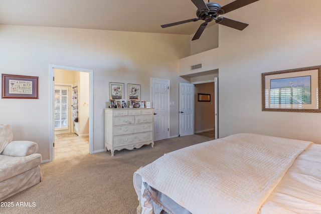 bedroom featuring multiple windows, high vaulted ceiling, light colored carpet, and ceiling fan