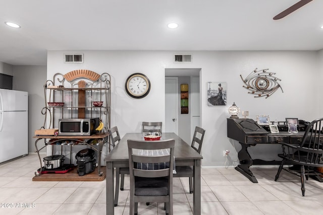 711 E Laurel Dr Unit 17, Casa Grande, AZ 85122 - dining space with light tile patterned flooring, recessed lighting, and visible vents