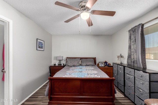 711 E Laurel Dr Unit 17, Casa Grande, AZ 85122 - bedroom featuring ceiling fan, baseboards, a textured ceiling, and dark wood-style floors