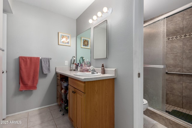 711 E Laurel Dr Unit 17, Casa Grande, AZ 85122 - full bathroom with tile patterned flooring, baseboards, toilet, a stall shower, and vanity