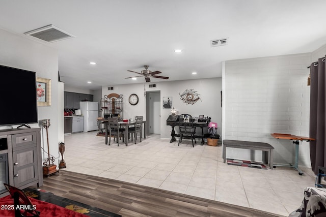 711 E Laurel Dr Unit 17, Casa Grande, AZ 85122 - living area with light tile patterned floors, visible vents, recessed lighting, and a ceiling fan